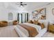 Tranquil main bedroom boasting a tray ceiling, stylish wall art, and plush bedding, creating a serene retreat at 14024 Alley Son St, Huntersville, NC 28078