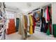 Large walk-in closet with clothes racks, shelving, and drawers for optimal storage at 14024 Alley Son St, Huntersville, NC 28078