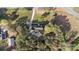Bird's-eye view of the home set back from the road with mature trees on a sprawling lot at 14124 Hiwassee Rd, Huntersville, NC 28078