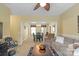 Open-concept living room with connection to the dining area at 14124 Hiwassee Rd, Huntersville, NC 28078