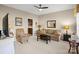 Comfortable living room with neutral walls, carpet floors, and access to the kitchen at 14124 Hiwassee Rd, Huntersville, NC 28078