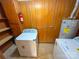 Basement with laundry area and utility setup, including a water heater at 2020 Parkdale Ave, Gastonia, NC 28052