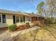 Charming home with brick and siding exterior, and mature landscaping at 2020 Parkdale Ave, Gastonia, NC 28052