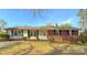 Charming single-story home featuring brick and siding with well-maintained landscaping at 2020 Parkdale Ave, Gastonia, NC 28052