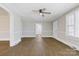 Open living room featuring hardwood floors, neutral color scheme, and an inviting atmosphere at 209 N Yadkin Ave, Spencer, NC 28159
