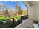 Charming balcony with beautiful views of landscaped yard, flowering trees and lush greenery at 209 Sardis Ln, Charlotte, NC 28270