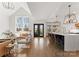 Open floor plan featuring a living room that flows into the kitchen, ideal for entertaining at 209 Sardis Ln, Charlotte, NC 28270