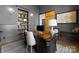 Stylish home office featuring custom built-ins, modern lighting, and a comfortable workspace in a peaceful setting at 209 Sardis Ln, Charlotte, NC 28270