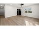 Bedroom features modern flooring, neutral paint, a ceiling fan, and two closets at 2120 Green Oak Dr, Shelby, NC 28152
