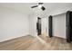 This bedroom features a ceiling fan, a closet, and an entrance to the bathroom at 2120 Green Oak Dr, Shelby, NC 28152