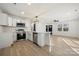 Bright kitchen features stainless steel appliances, white cabinets, and a quartz countertop at 2120 Green Oak Dr, Shelby, NC 28152