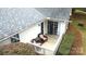 Cozy patio with seating area, providing an ideal spot for outdoor enjoyment at 21205 Cold Spring Ln, Cornelius, NC 28031