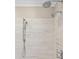 Close-up of shower with multiple shower heads and modern tile work at 21721 Shoveller Ct, Cornelius, NC 28031