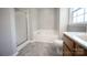 Bathroom featuring tile floors, soaking tub, and stand-up shower at 2919 Bridgeville Ln, Charlotte, NC 28262