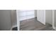 Walk-in closet with hardwood floors and wire shelving at 2919 Bridgeville Ln, Charlotte, NC 28262
