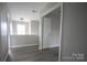 Upstairs hallway featuring hardwood floors and natural light at 2919 Bridgeville Ln, Charlotte, NC 28262
