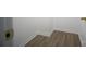 Hallway showcasing modern flooring and white trim at 2919 Bridgeville Ln, Charlotte, NC 28262