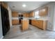 Open kitchen features an island, black appliances, and updated cabinetry with ample counter space at 2919 Bridgeville Ln, Charlotte, NC 28262