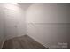Walk-in closet with hardwood floors and wire shelving at 2919 Bridgeville Ln, Charlotte, NC 28262