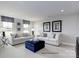 Spacious living room with neutral tones, plush seating, and ample natural light at 3008 Bramble Hedge Dr # 3272, Indian Trail, NC 28079