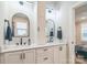 Modern bathroom with double sinks, sleek fixtures, and stylish arched mirrors at 3105 Beans Blvd, Charlotte, NC 28203