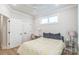 Charming bedroom with a ceiling fan, natural light, closet, and modern decor elements for a serene atmosphere at 3105 Beans Blvd, Charlotte, NC 28203
