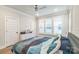 Comfortable bedroom featuring crown molding, natural light, and modern decor creating a serene and inviting space at 3105 Beans Blvd, Charlotte, NC 28203