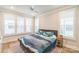 Bright bedroom with plantation shutters offering an abundance of natural light for a relaxing retreat at 3105 Beans Blvd, Charlotte, NC 28203