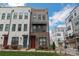 Charming three-story townhome with modern design elements and well-maintained landscaping at 3105 Beans Blvd, Charlotte, NC 28203