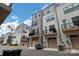 Modern townhome exterior featuring a balcony, attached garage, and contemporary siding at 3105 Beans Blvd, Charlotte, NC 28203