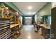 Organized garage space with ample storage, shelving, and workbenches, ideal for projects and vehicle storage at 3105 Beans Blvd, Charlotte, NC 28203