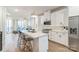 Bright, modern kitchen with white cabinets, quartz countertops, and stainless steel appliances at 3105 Beans Blvd, Charlotte, NC 28203