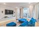 Comfortable living room with modern built-ins, stylish furniture, and ample natural light at 3105 Beans Blvd, Charlotte, NC 28203