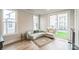 Serene living area with comfortable seating, natural light, and access to a balcony at 3105 Beans Blvd, Charlotte, NC 28203