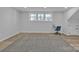 Spacious basement area with a large window, a desk, and neutral-toned carpeting at 3205 19Th Ne Ave, Hickory, NC 28601