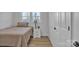 Cozy bedroom featuring a neutral color scheme, ample natural light, and hardwood floors at 3205 19Th Ne Ave, Hickory, NC 28601