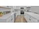 Modern kitchen featuring white cabinets, stainless steel appliances, and stylish countertops at 3205 19Th Ne Ave, Hickory, NC 28601