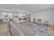 Bright living room featuring hardwood floors, large windows, and modern furniture at 3205 19Th Ne Ave, Hickory, NC 28601
