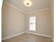 Inviting bedroom with vinyl flooring, a bright window, and neutral-colored walls at 333 City Ave, Lancaster, SC 29720