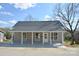 Charming single-story home with a welcoming front porch, offering curb appeal and outdoor living space at 333 City Ave, Lancaster, SC 29720