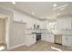 Modern kitchen with white cabinetry, stainless steel appliances, and stylish countertops at 333 City Ave, Lancaster, SC 29720