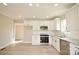 Bright kitchen featuring white cabinets, stainless steel appliances, and modern countertops at 333 City Ave, Lancaster, SC 29720