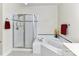 Relaxing bathroom complete with a glass shower and soaking tub at 3721 Oak View Ct, Matthews, NC 28105