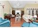Bright and spacious living room with hardwood floors, vaulted ceilings, and neutral color palette at 3721 Oak View Ct, Matthews, NC 28105