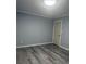 Empty bedroom with gray flooring, neutral walls and good natural lighting at 3810 W Franklin Blvd, Gastonia, NC 28052