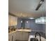 Bright kitchen showcases stylish lighting, white cabinetry, and sleek countertops at 3810 W Franklin Blvd, Gastonia, NC 28052