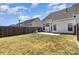 Spacious backyard with patio, green lawn, and fenced perimeter, perfect for outdoor living and privacy at 4039 Holly Villa Cir, Indian Trail, NC 28079