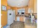 Well-lit kitchen adjacent to breakfast nook, offering modern appliances and ample cabinet space at 4039 Holly Villa Cir, Indian Trail, NC 28079