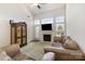 Spacious living room with vaulted ceilings, a fireplace, and plenty of natural light at 4039 Holly Villa Cir, Indian Trail, NC 28079