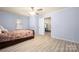 Bright bedroom with wood-look floors and great light at 4487 Catawba Burris Rd, Denver, NC 28037